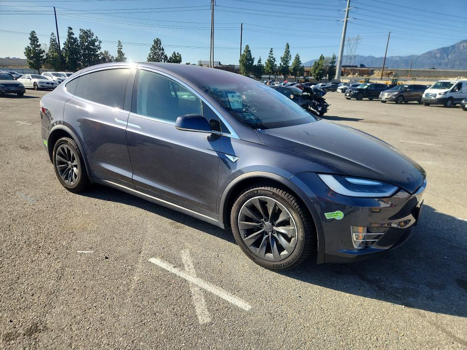 Photo 4 from auction – 2016 TESLA MODEL X with VIN 5YJXCAE28GF004850