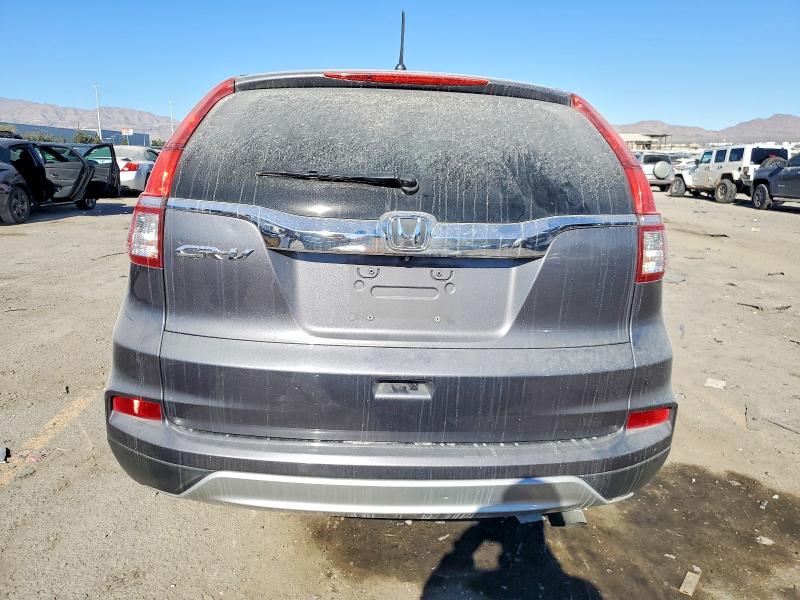 Photo 6 from auction – 2015 HONDA CR-V with VIN 3CZRM3H54FG706674