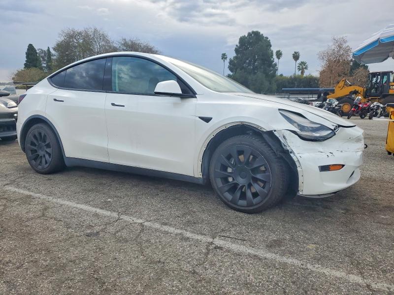 Photo 4 from auction – 2021 TESLA MODEL Y with VIN 5YJYGDED4MF114995