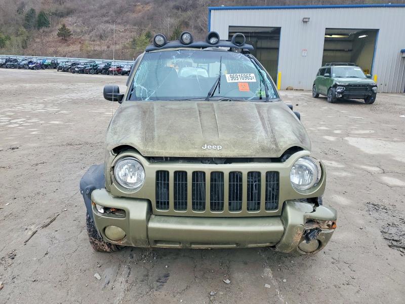 Photo 5 from auction – 2002 JEEP LIBERTY RE with VIN 1J4GL38K72W347090
