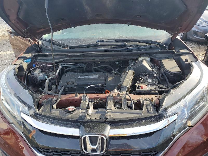 Photo 12 from auction – 2015 HONDA CR-V LX with VIN 2HKRM4H38FH701561