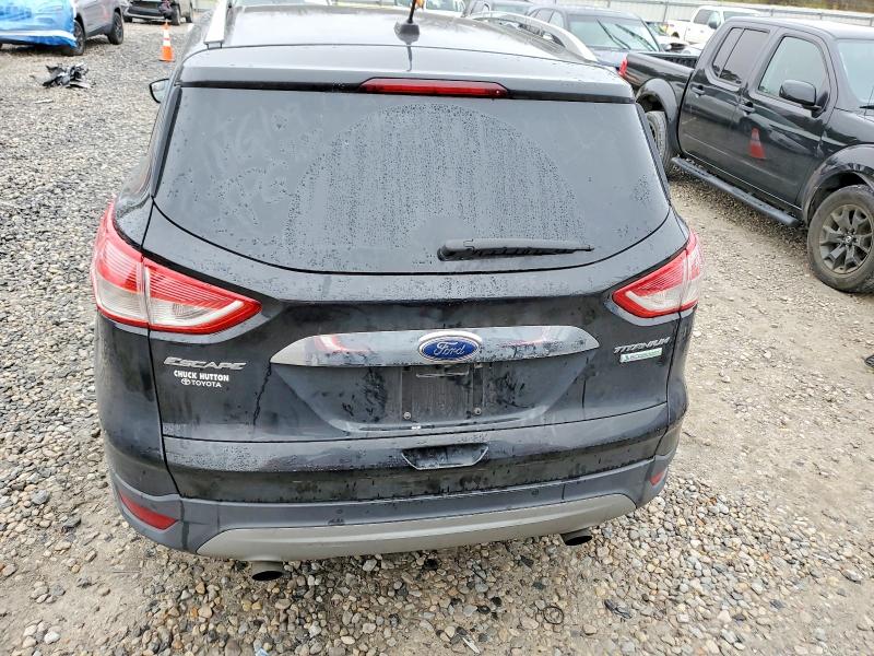 Photo 6 from auction – 2015 FORD ESCAPE TIT with VIN 1FMCU0J92FUC04536