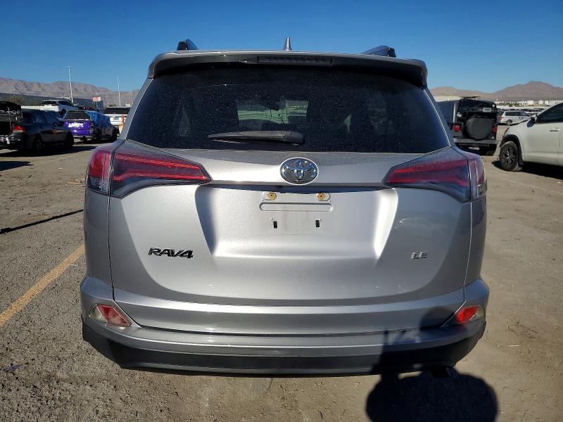 Photo 6 from auction – 2018 TOYOTA RAV4 LE with VIN JTMZFREV7JD131614