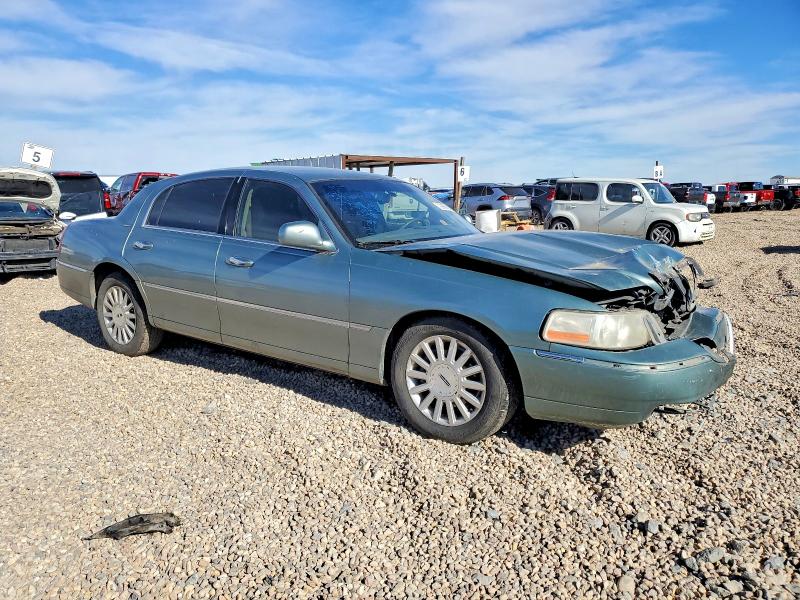 Photo 4 from auction – 2004 LINCOLN TOWN CAR E with VIN 1LNHM81W64Y684662