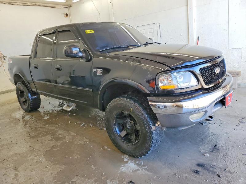 Photo 4 from auction – 2003 FORD F150 SUPER with VIN 1FTRW08L93KD40924