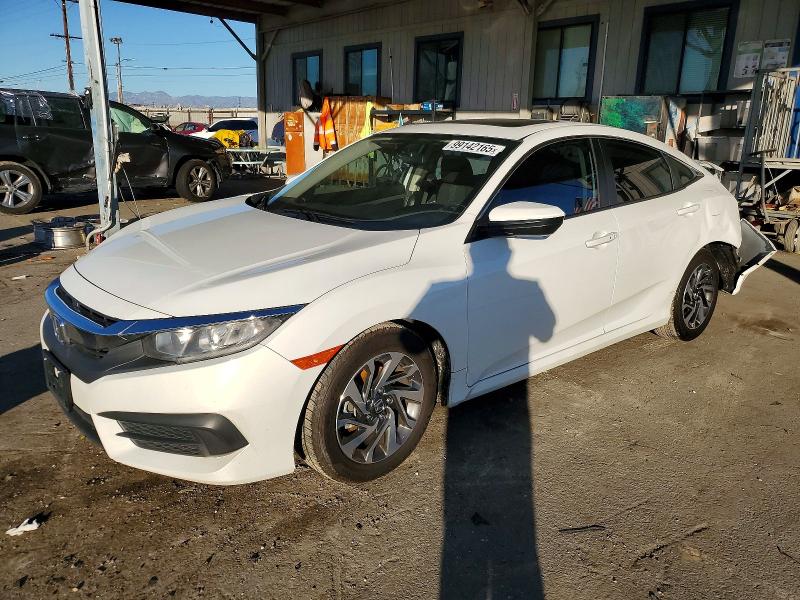 HONDA CIVIC EX 2017 with VIN 2HGFC2F76HH556730 - Photo from auction