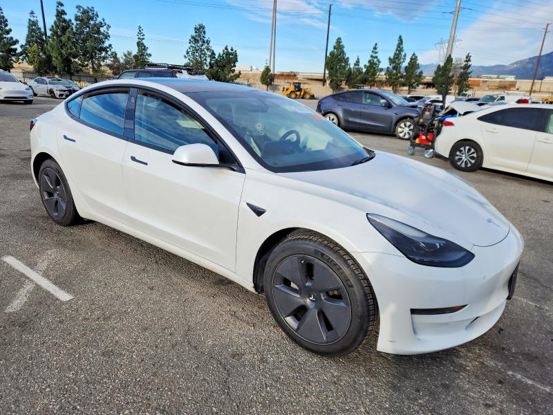 Photo 4 from auction – 2021 TESLA MODEL 3 with VIN 5YJ3E1EA4MF873960