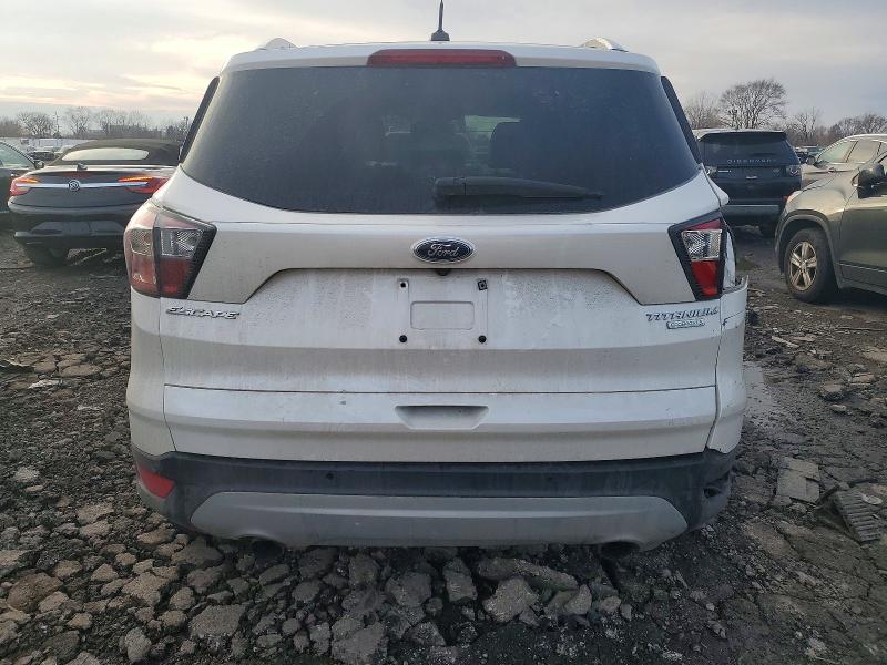 Photo 6 from auction – 2017 FORD ESCAPE TIT with VIN 1FMCU0J93HUB20714