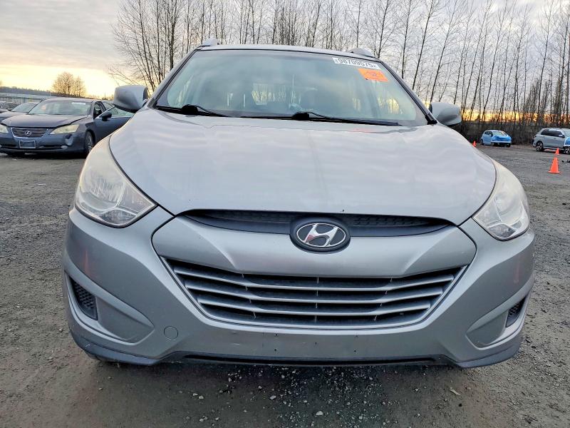 Photo 5 from auction – 2011 HYUNDAI TUCSON with VIN KM8JU3AC9BU273125