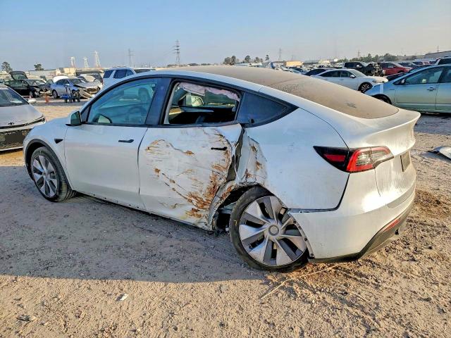 Photo 2 from auction – 2023 TESLA MODEL Y with VIN 7SAYGDEE6PA108869