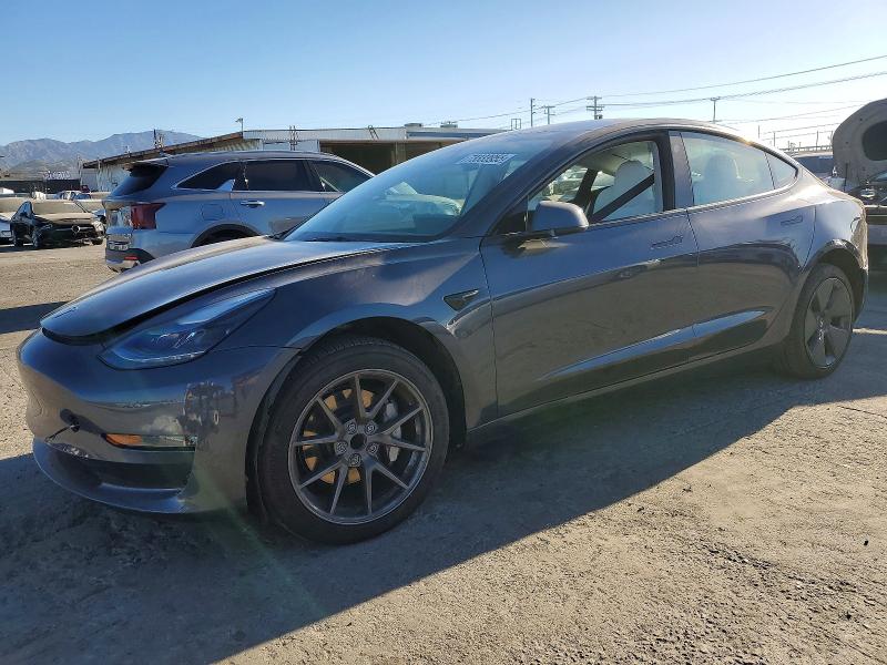 TESLA MODEL 3 2023 with VIN 5YJ3E1EAXPF647958 - Photo from auction