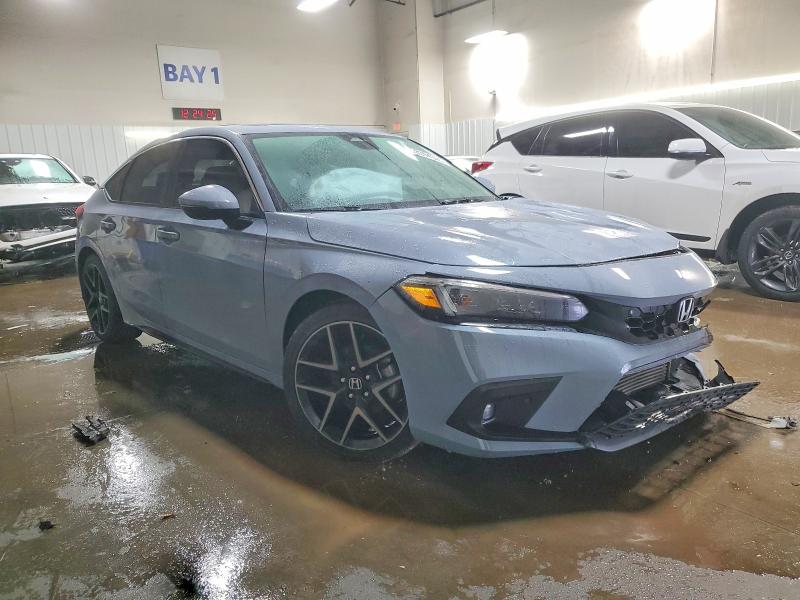 Photo 4 from auction – 2022 HONDA CIVIC SPOR with VIN 19XFL1H86NE023749