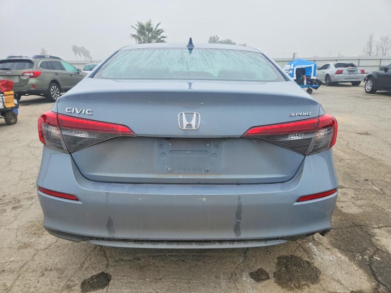 Photo 6 from auction – 2023 HONDA CIVIC SPOR with VIN 2HGFE2F50PH519244