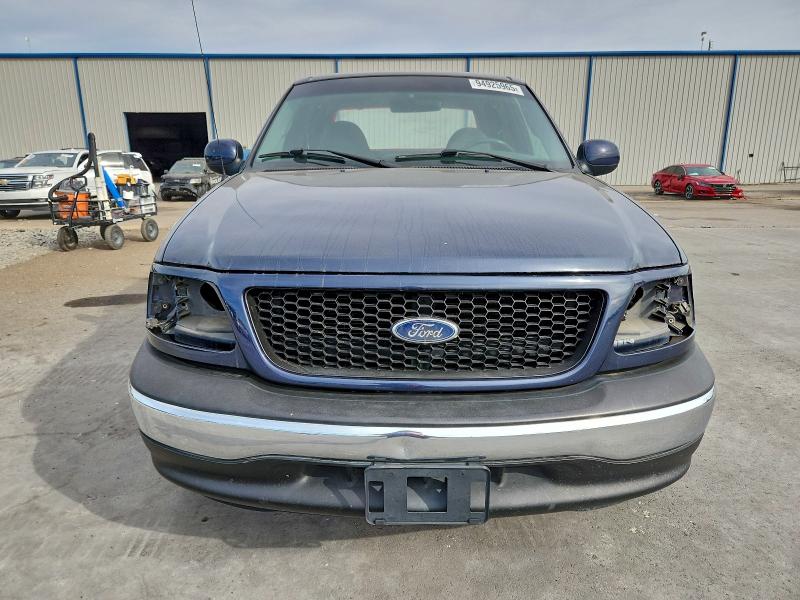 Photo 5 from auction – 2001 FORD F150 SUPER with VIN 1FTRW07W41KE52233