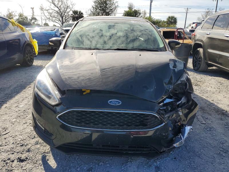 Photo 5 from auction – 2015 FORD FOCUS with VIN 1FADP3F27FL273263