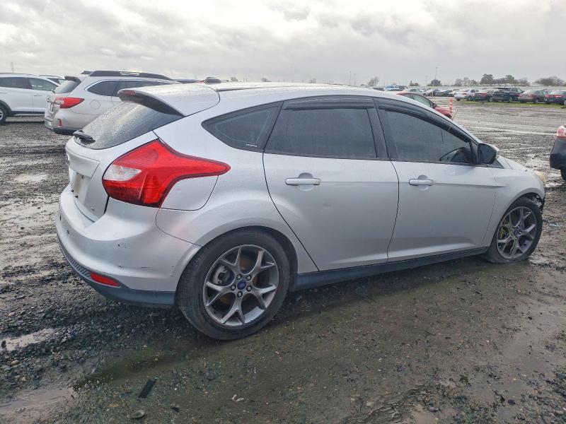 Photo 3 from auction – 2013 FORD FOCUS SE with VIN 1FADP3K25DL384008