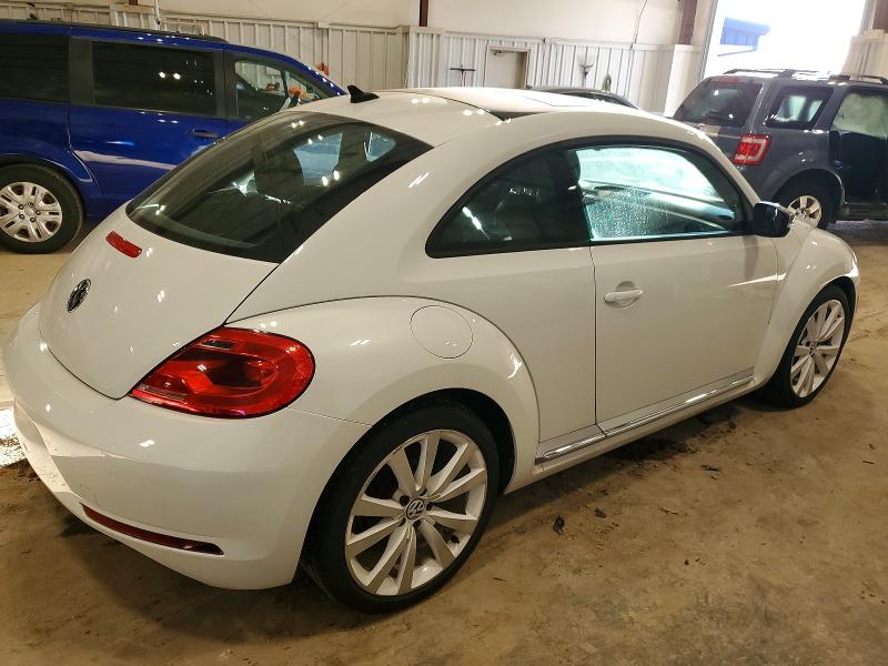 Photo 3 from auction – 2014 VOLKSWAGEN BEETLE with VIN 3VWJ17AT7EM655261