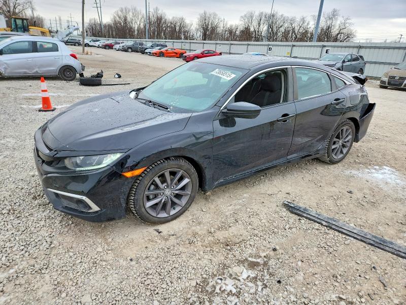 HONDA CIVIC 2019 with VIN 19XFC1F33KE000593 - Photo from auction