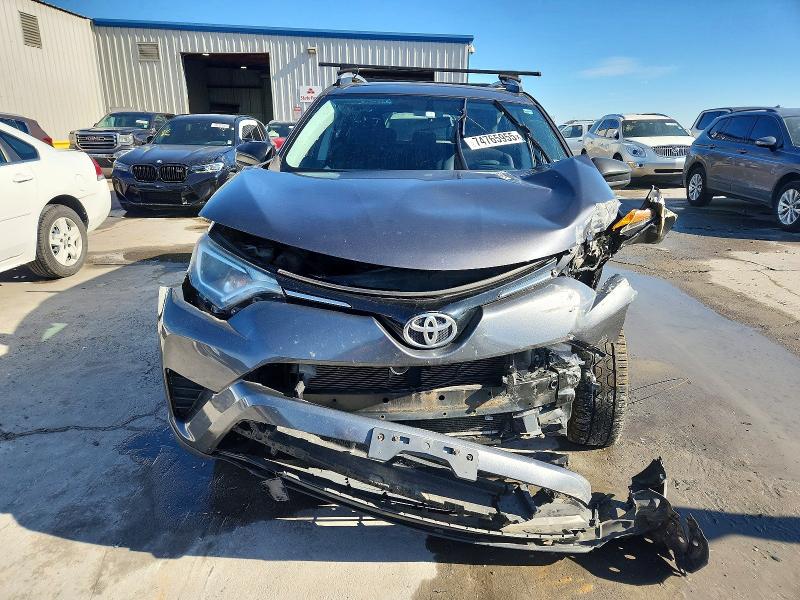 Photo 5 from auction – 2016 TOYOTA RAV4 with VIN 2T3BFREV6GW446191