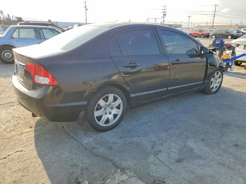 Photo 3 from auction – 2010 HONDA CIVIC with VIN 19XFA1F52AE021621