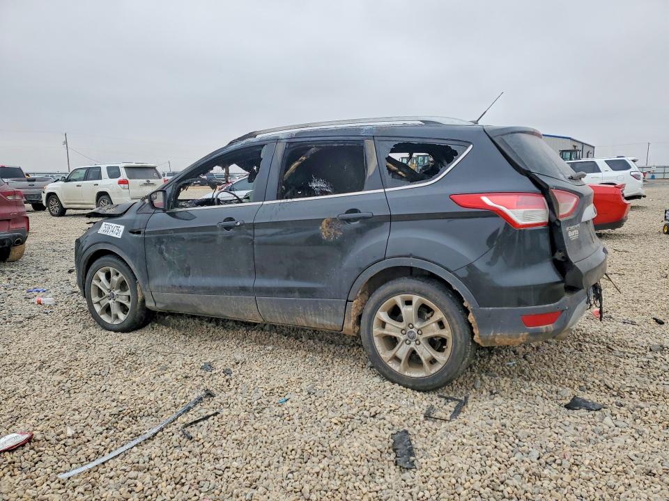 Photo 2 from auction – 2014 FORD ESCAPE with VIN 1FMCU9JX5EUD38958