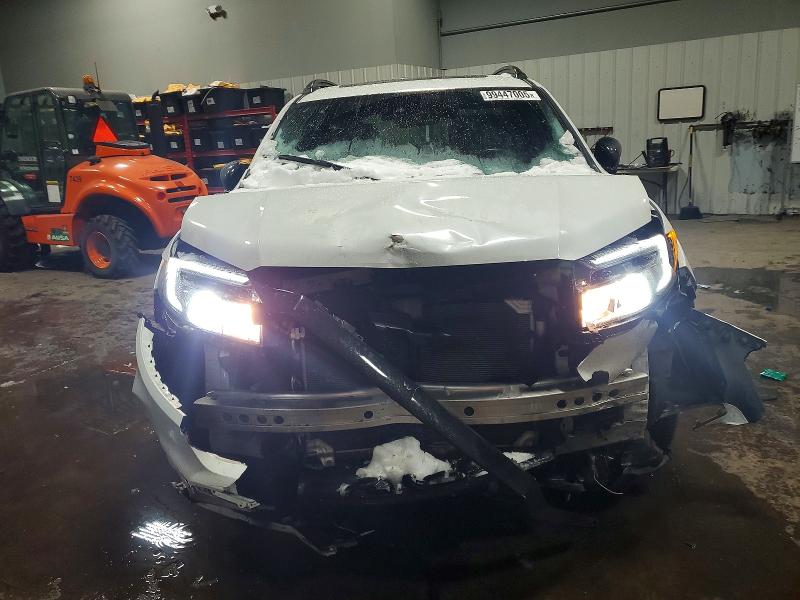 Photo 5 from auction – 2022 HONDA PASSPORT E with VIN 5FNYF8H07NB003488