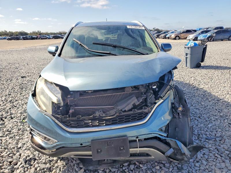 Photo 5 from auction – 2015 HONDA CR-V with VIN 2HKRM3H73FH540114