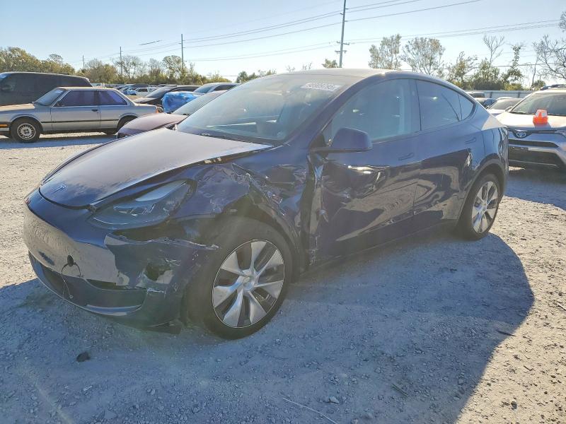 TESLA MODEL Y 2023 with VIN 7SAYGDEE0PA203072 - Photo from auction