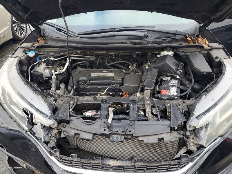 Photo 12 from auction – 2015 HONDA CR-V with VIN 5J6RM4H3XFL096447