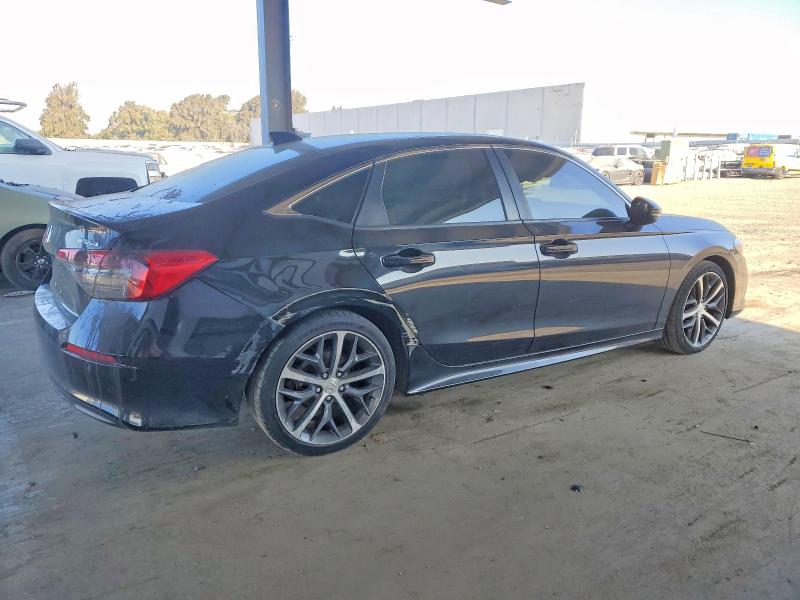 Photo 3 from auction – 2022 HONDA CIVIC with VIN 2HGFE1F97NH300467
