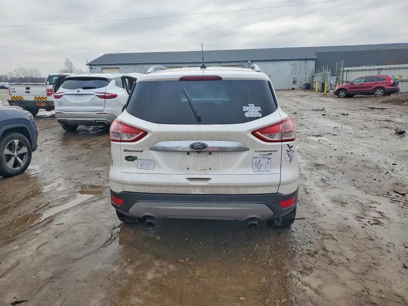 Photo 6 from auction – 2015 FORD ESCAPE TIT with VIN 1FMCU9J99FUB39236