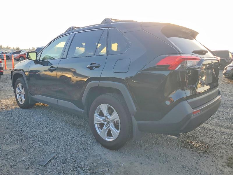 Photo 2 from auction – 2019 TOYOTA RAV4 XLE with VIN JTMW1RFV9KD024369
