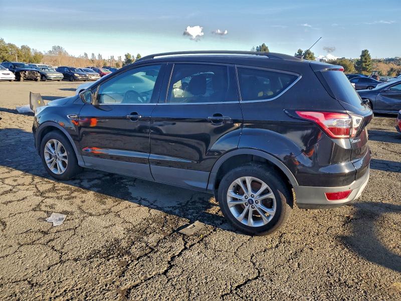 Photo 2 from auction – 2017 FORD ESCAPE SE with VIN 1FMCU0G92HUB29993