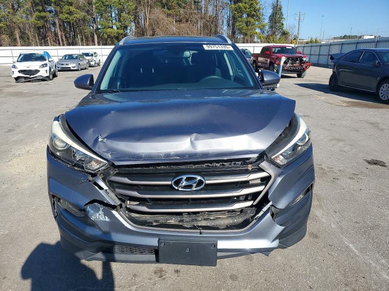 Photo 5 from auction – 2016 HYUNDAI TUCSON LIM with VIN KM8J3CA49GU208052