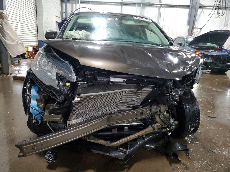 Photo 5 from auction – 2014 HONDA CR-V EXL with VIN 5J6RM4H79EL074182