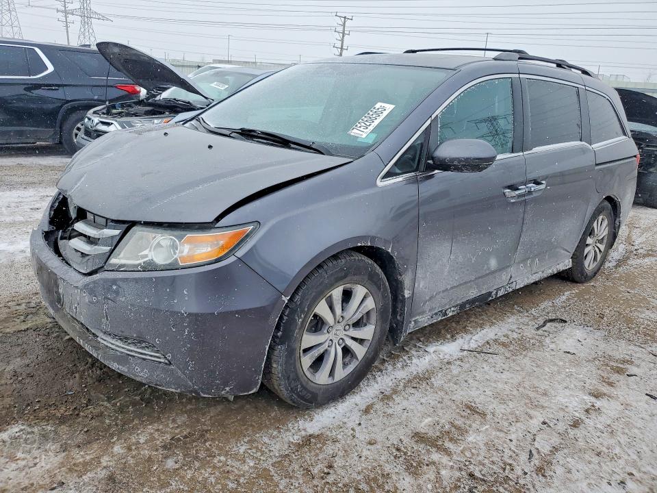HONDA ODYSSEY 2015 with VIN 5FNRL5H64FB101248 - Photo from auction