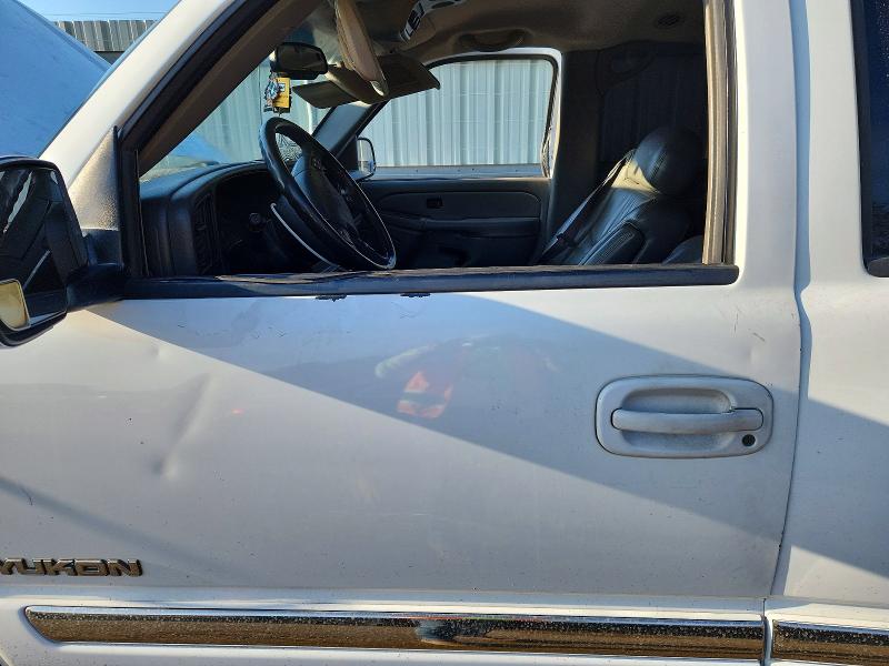 Photo 7 from auction – 2004 GMC YUKON with VIN 1GKEC13Z04R175805