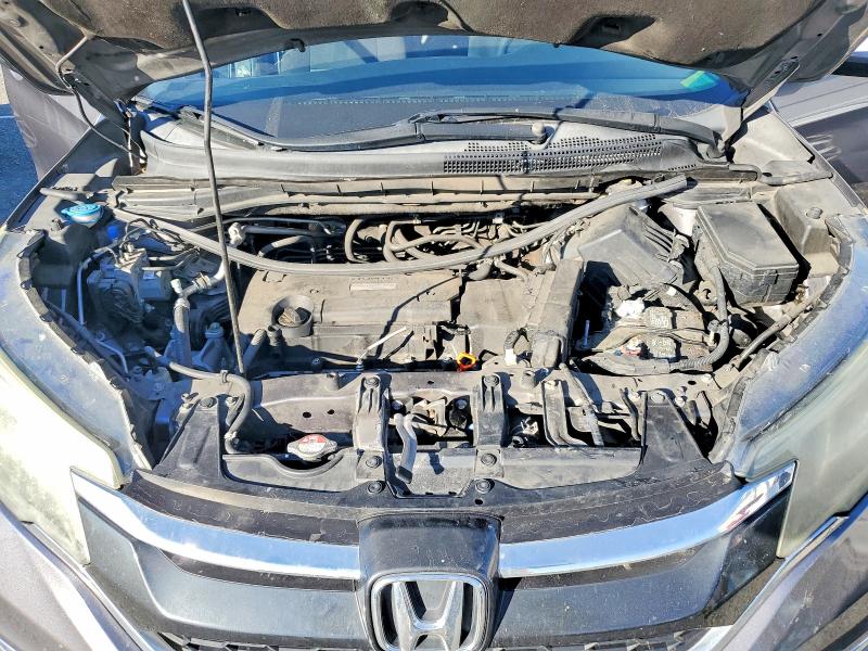 Photo 11 from auction – 2016 HONDA CR-V EX with VIN 3CZRM3H55GG707639