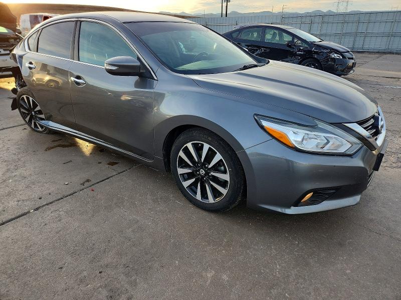 Photo 4 from auction – 2018 NISS ALTIMA with VIN 1N4AL3AP3JC176328