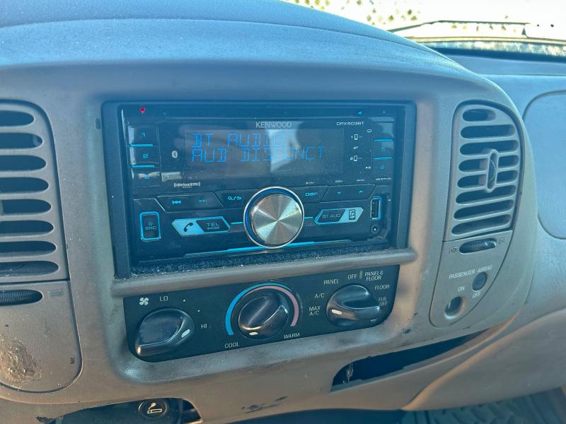 Photo 11 from auction – 2003 FORD F150 with VIN 1FTRX07WX3KC83979