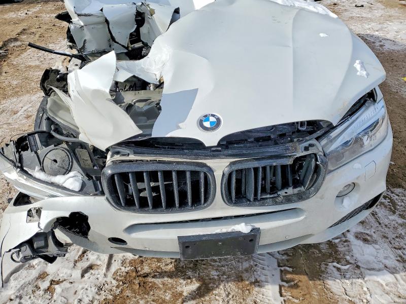Photo 11 from auction – 2014 BMW X5 XDRIVE3 with VIN 5UXKR0C56E0H28498