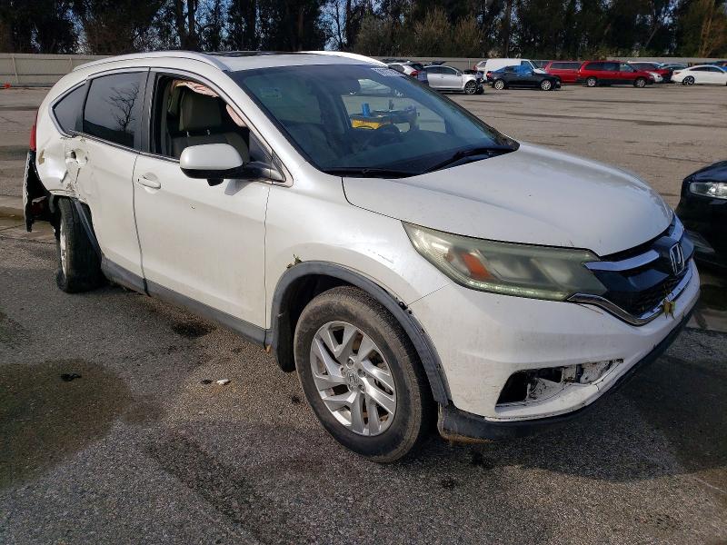 Photo 4 from auction – 2015 HONDA CR-V EXL with VIN 5J6RM4H79FL036579