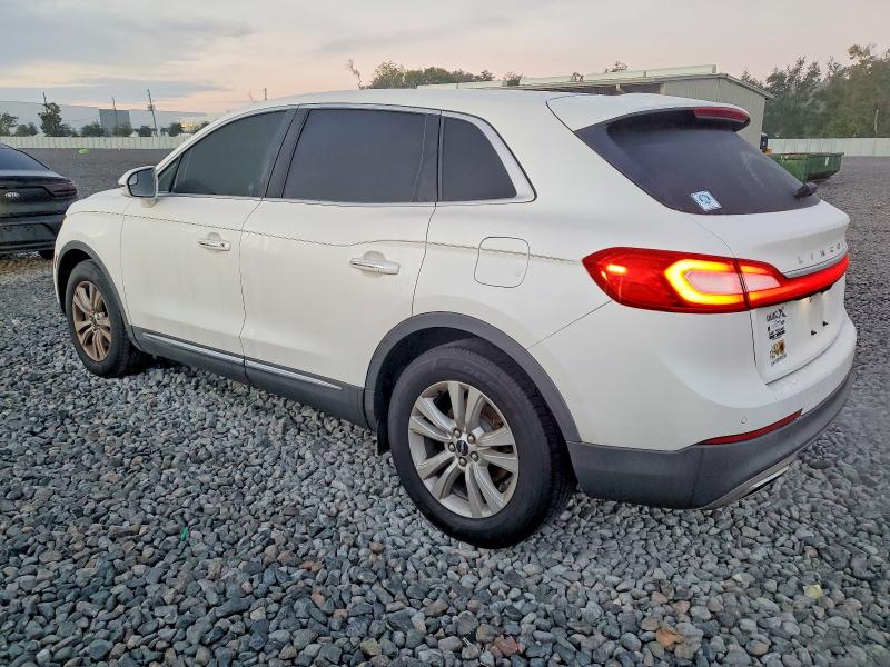 Photo 2 from auction – 2016 LINCOLN MKX PREMIE with VIN 2LMTJ6JRXGBL76904