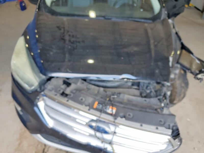 Photo 12 from auction – 2017 FORD ESCAPE SE with VIN 1FMCU9GD0HUB58692