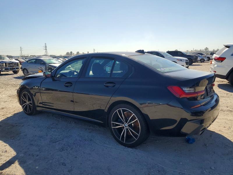 Photo 2 from auction – 2021 BMW 330E with VIN WBA5P7C04MFK24328