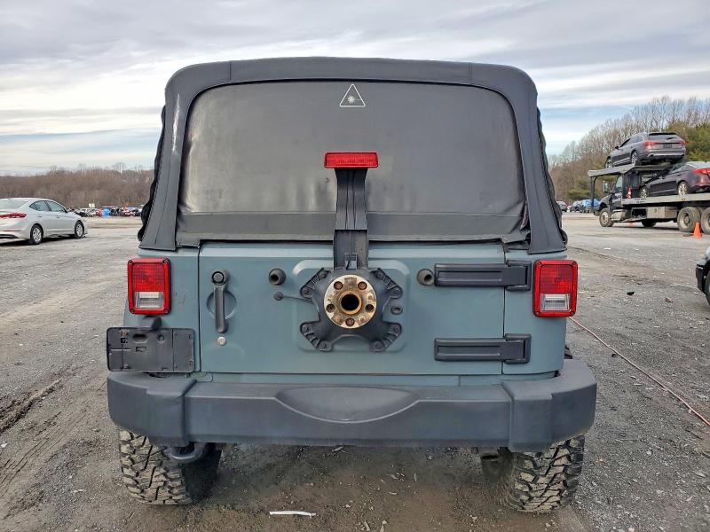 Photo 6 from auction – 2014 JEEP WRANGLER U with VIN 1C4BJWDG6EL148983