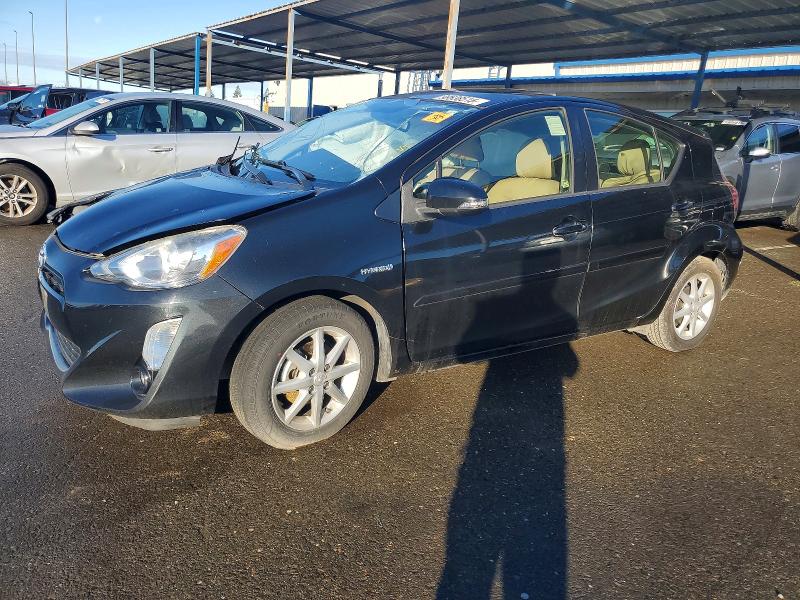 TOYOTA PRIUS C 2015 with VIN JTDKDTB39F1100395 - Photo from auction
