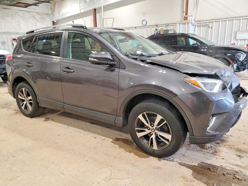 Photo 4 from auction – 2017 TOYOTA RAV4 with VIN JTMRFREV1HJ141390