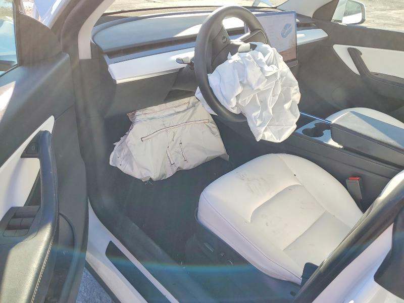Photo 8 from auction – 2021 TESLA MODEL Y with VIN 5YJYGAEE8MF212709