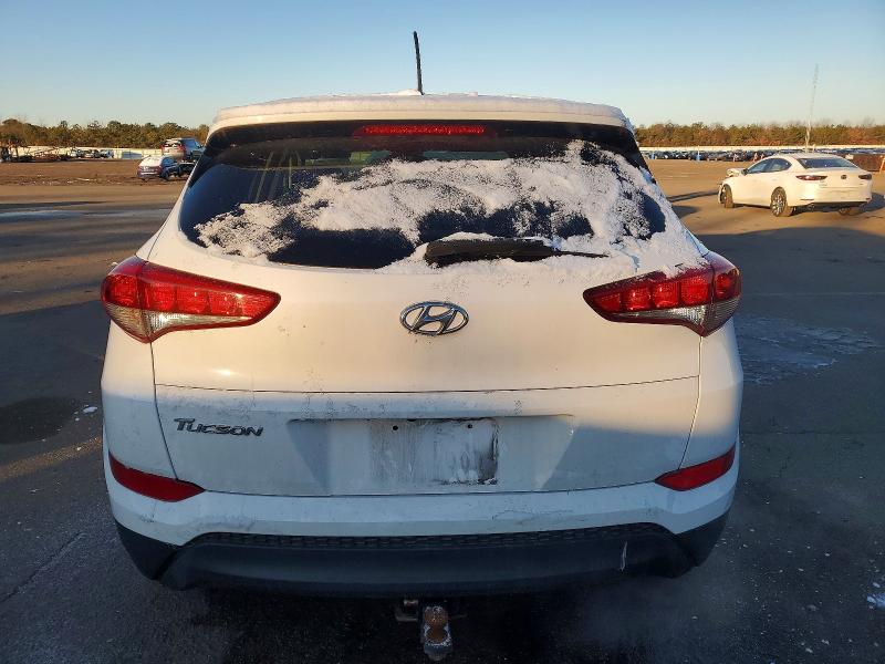 Photo 6 from auction – 2016 HYUNDAI TUCSON with VIN KM8J23A40GU135320